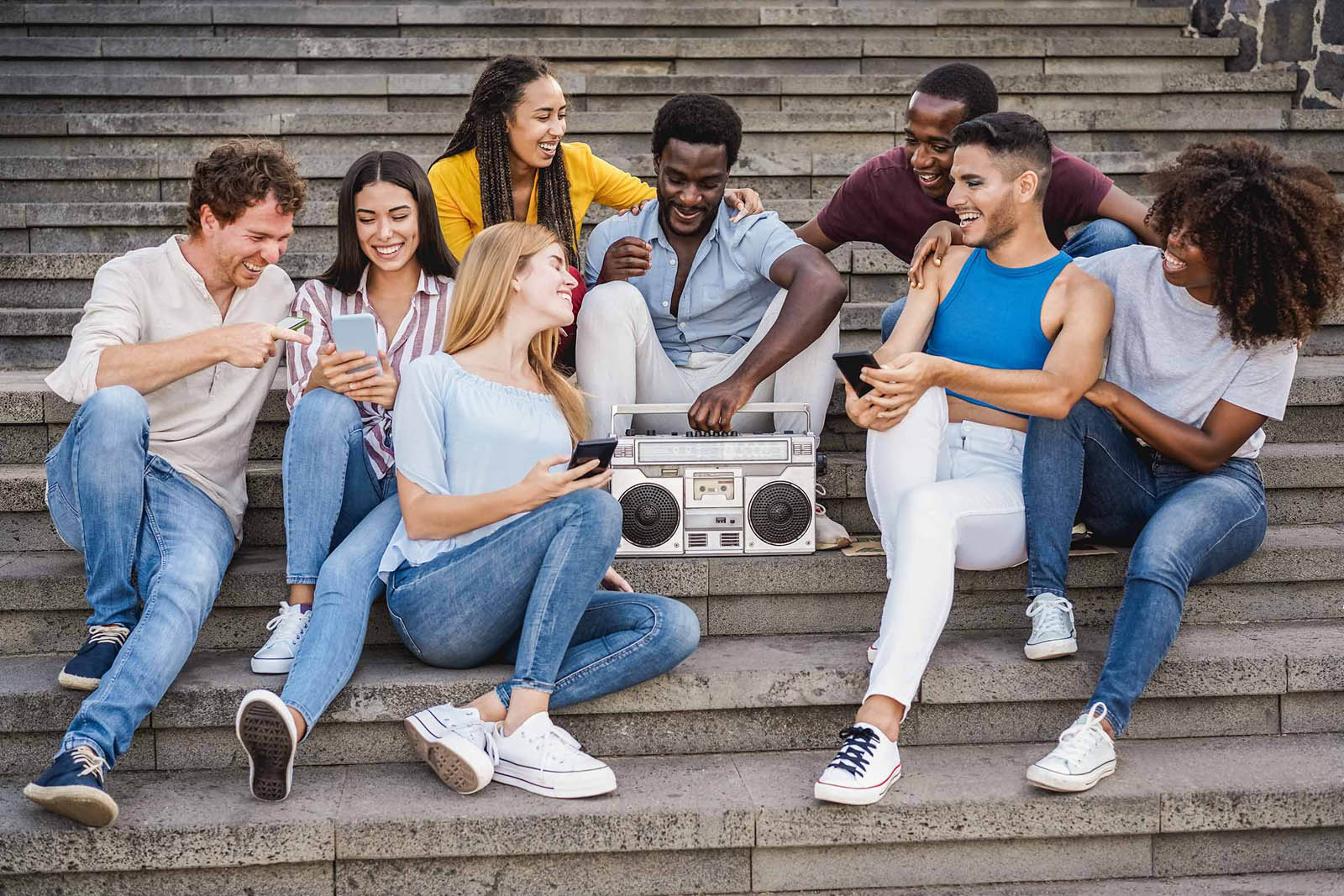 https://www.crresearch.com/wp-content/uploads/2022/08/young_diverse_people_having_fun_listening_music_lgbtq_lowres.jpg