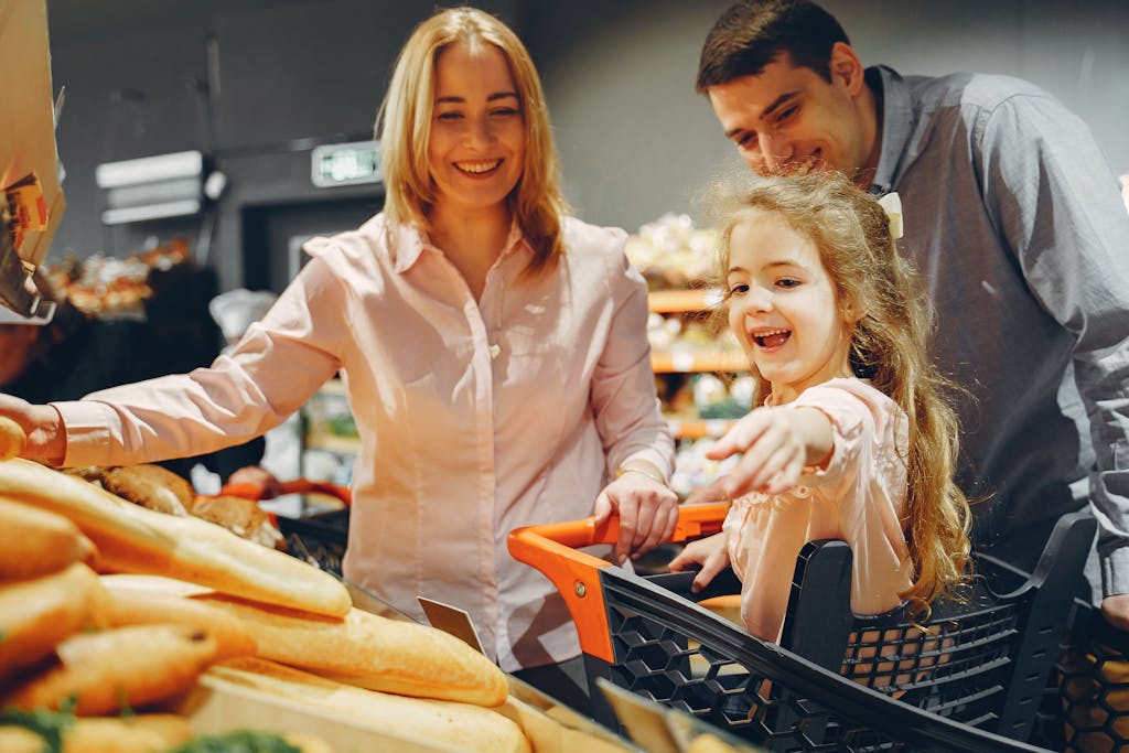 Family Doing Shopping in the Grocery Store